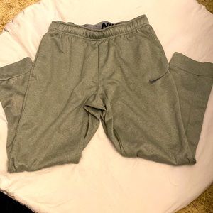 Nike THERMA-FIT Gray joggers.